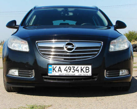 Черный Опель Инсигния, объемом двигателя 2 л и пробегом 257 тыс. км за 9500 $, фото 1 на Automoto.ua