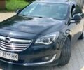 Черный Опель Инсигния, объемом двигателя 2 л и пробегом 140 тыс. км за 13500 $, фото 1 на Automoto.ua