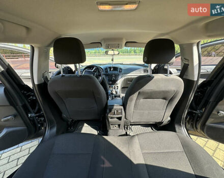 Черный Опель Инсигния, объемом двигателя 2 л и пробегом 299 тыс. км за 7799 $, фото 6 на Automoto.ua