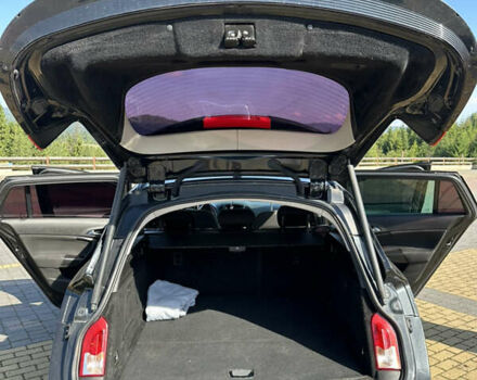 Черный Опель Инсигния, объемом двигателя 2 л и пробегом 299 тыс. км за 7799 $, фото 4 на Automoto.ua