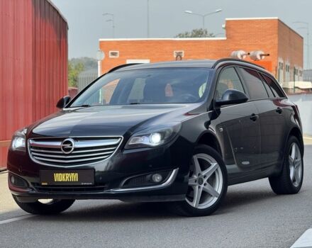 Черный Опель Инсигния, объемом двигателя 2 л и пробегом 253 тыс. км за 8950 $, фото 1 на Automoto.ua