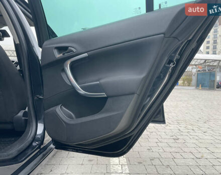 Черный Опель Инсигния, объемом двигателя 2 л и пробегом 180 тыс. км за 9400 $, фото 76 на Automoto.ua