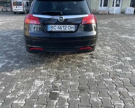 Черный Опель Инсигния, объемом двигателя 1.96 л и пробегом 340 тыс. км за 7500 $, фото 5 на Automoto.ua