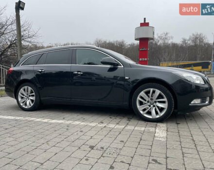 Черный Опель Инсигния, объемом двигателя 2 л и пробегом 180 тыс. км за 9400 $, фото 14 на Automoto.ua