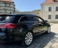 Чорний Опель Інсігнія, об'ємом двигуна 2 л та пробігом 282 тис. км за 8497 $, фото 1 на Automoto.ua