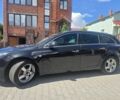 Чорний Опель Інсігнія, об'ємом двигуна 2 л та пробігом 280 тис. км за 8500 $, фото 2 на Automoto.ua