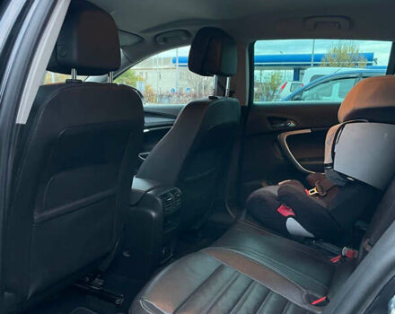 Черный Опель Инсигния, объемом двигателя 2 л и пробегом 243 тыс. км за 12500 $, фото 21 на Automoto.ua