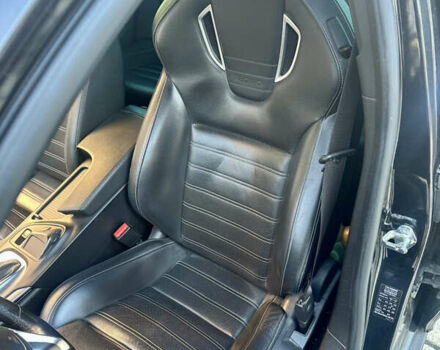 Черный Опель Инсигния, объемом двигателя 2 л и пробегом 250 тыс. км за 9800 $, фото 5 на Automoto.ua