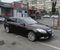 Черный Опель Инсигния, объемом двигателя 2 л и пробегом 374 тыс. км за 3400 $, фото 3 на Automoto.ua
