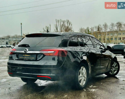 Чорний Опель Інсігнія, об'ємом двигуна 1.96 л та пробігом 264 тис. км за 9800 $, фото 1 на Automoto.ua