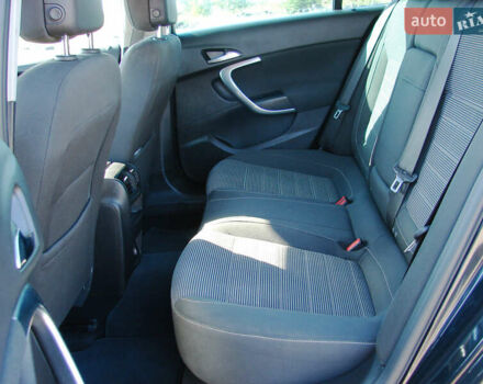 Черный Опель Инсигния, объемом двигателя 2 л и пробегом 257 тыс. км за 9500 $, фото 14 на Automoto.ua