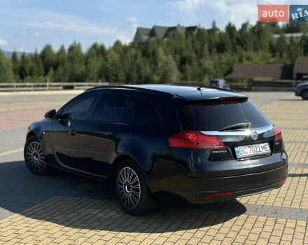 Черный Опель Инсигния, объемом двигателя 2 л и пробегом 299 тыс. км за 7799 $, фото 2 на Automoto.ua