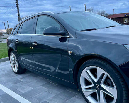 Черный Опель Инсигния, объемом двигателя 2 л и пробегом 243 тыс. км за 12500 $, фото 4 на Automoto.ua