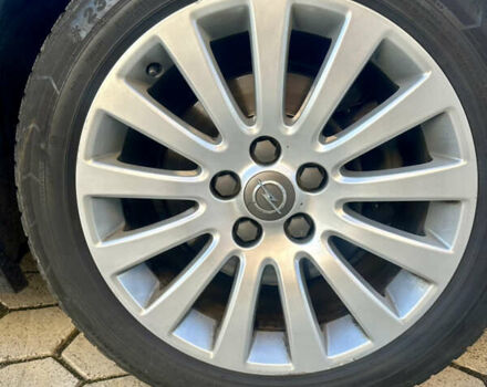 Черный Опель Инсигния, объемом двигателя 2 л и пробегом 250 тыс. км за 9800 $, фото 4 на Automoto.ua