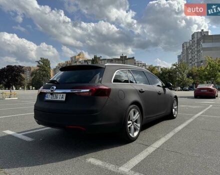 Чорний Опель Інсігнія, об'ємом двигуна 1.96 л та пробігом 237 тис. км за 12000 $, фото 3 на Automoto.ua