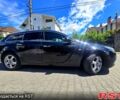 Чорний Опель Інсігнія, об'ємом двигуна 2 л та пробігом 270 тис. км за 8500 $, фото 4 на Automoto.ua