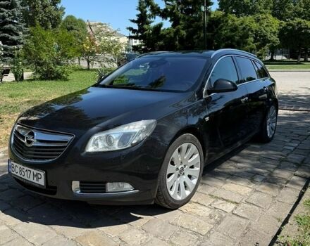 Чорний Опель Інсігнія, об'ємом двигуна 1.96 л та пробігом 282 тис. км за 8500 $, фото 2 на Automoto.ua