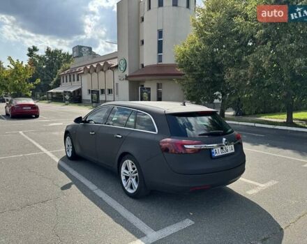 Чорний Опель Інсігнія, об'ємом двигуна 1.96 л та пробігом 237 тис. км за 12000 $, фото 2 на Automoto.ua