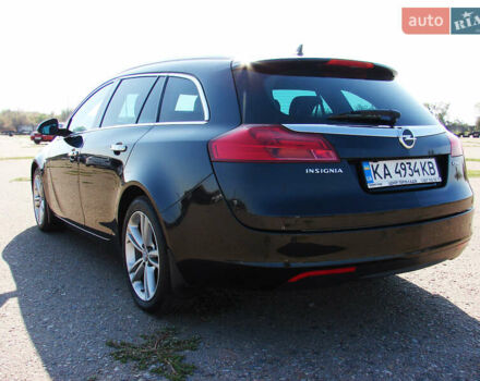 Черный Опель Инсигния, объемом двигателя 2 л и пробегом 257 тыс. км за 9500 $, фото 6 на Automoto.ua