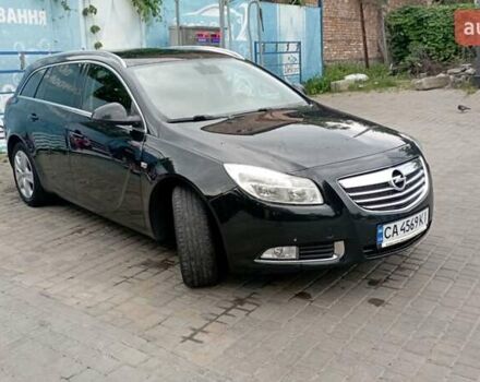 Чорний Опель Інсігнія, об'ємом двигуна 1.96 л та пробігом 234 тис. км за 8800 $, фото 1 на Automoto.ua