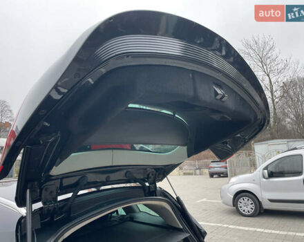 Черный Опель Инсигния, объемом двигателя 2 л и пробегом 180 тыс. км за 9400 $, фото 94 на Automoto.ua