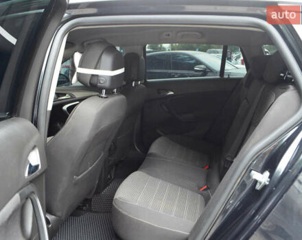 Черный Опель Инсигния, объемом двигателя 1.96 л и пробегом 213 тыс. км за 8999 $, фото 15 на Automoto.ua