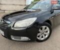 Черный Опель Инсигния, объемом двигателя 2 л и пробегом 210 тыс. км за 9000 $, фото 1 на Automoto.ua