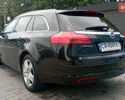 Чорний Опель Інсігнія, об'ємом двигуна 1.96 л та пробігом 234 тис. км за 8800 $, фото 7 на Automoto.ua