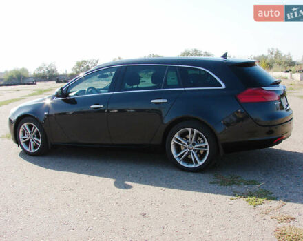 Черный Опель Инсигния, объемом двигателя 2 л и пробегом 257 тыс. км за 9500 $, фото 5 на Automoto.ua