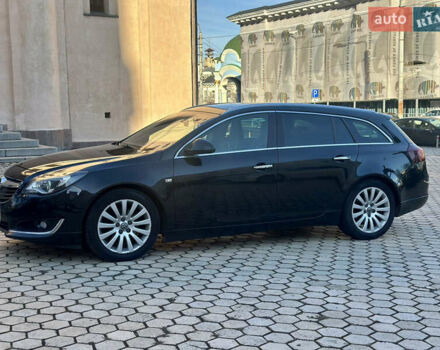 Черный Опель Инсигния, объемом двигателя 2 л и пробегом 250 тыс. км за 9800 $, фото 6 на Automoto.ua