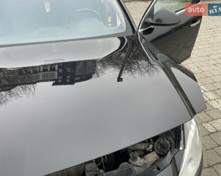 Черный Опель Инсигния, объемом двигателя 2 л и пробегом 180 тыс. км за 9400 $, фото 129 на Automoto.ua