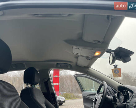 Черный Опель Инсигния, объемом двигателя 2 л и пробегом 180 тыс. км за 9400 $, фото 72 на Automoto.ua