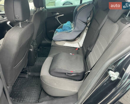 Черный Опель Инсигния, объемом двигателя 2 л и пробегом 180 тыс. км за 9400 $, фото 101 на Automoto.ua