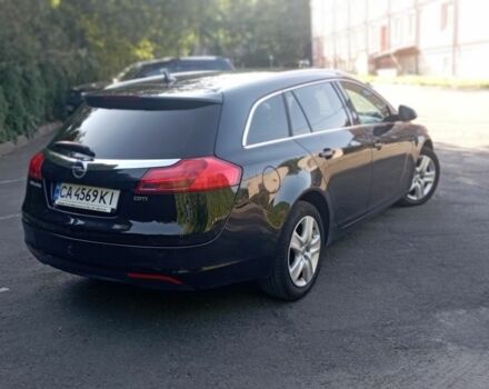 Чорний Опель Інсігнія, об'ємом двигуна 2 л та пробігом 236 тис. км за 8800 $, фото 1 на Automoto.ua