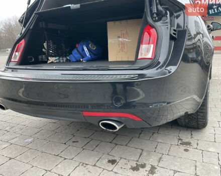 Черный Опель Инсигния, объемом двигателя 2 л и пробегом 180 тыс. км за 9400 $, фото 85 на Automoto.ua