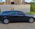 Черный Опель Инсигния, объемом двигателя 2 л и пробегом 295 тыс. км за 9000 $, фото 3 на Automoto.ua