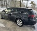Чорний Опель Інсігнія, об'ємом двигуна 2 л та пробігом 236 тис. км за 10999 $, фото 1 на Automoto.ua