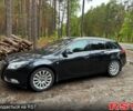 Черный Опель Инсигния, объемом двигателя 2 л и пробегом 215 тыс. км за 8550 $, фото 1 на Automoto.ua