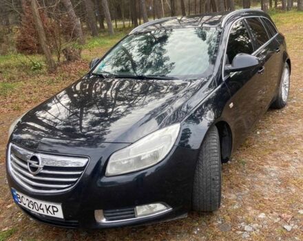 Черный Опель Инсигния, объемом двигателя 2 л и пробегом 270 тыс. км за 8800 $, фото 2 на Automoto.ua