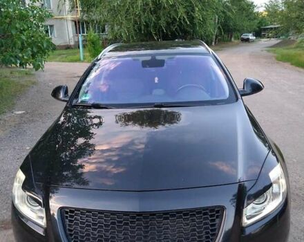 Чорний Опель Інсігнія, об'ємом двигуна 2 л та пробігом 198 тис. км за 12100 $, фото 19 на Automoto.ua