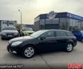 Черный Опель Инсигния, объемом двигателя 2 л и пробегом 250 тыс. км за 7500 $, фото 1 на Automoto.ua