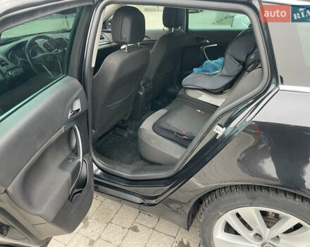 Черный Опель Инсигния, объемом двигателя 2 л и пробегом 180 тыс. км за 9400 $, фото 100 на Automoto.ua