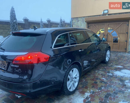 Чорний Опель Інсігнія, об'ємом двигуна 2 л та пробігом 182 тис. км за 9700 $, фото 12 на Automoto.ua