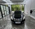 Черный Опель Инсигния, объемом двигателя 2 л и пробегом 300 тыс. км за 7500 $, фото 1 на Automoto.ua