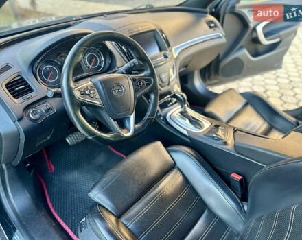 Черный Опель Инсигния, объемом двигателя 2 л и пробегом 250 тыс. км за 9800 $, фото 1 на Automoto.ua