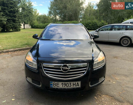 Чорний Опель Інсігнія, об'ємом двигуна 1.96 л та пробігом 215 тис. км за 8990 $, фото 1 на Automoto.ua