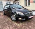 Черный Опель Инсигния, объемом двигателя 2 л и пробегом 244 тыс. км за 7450 $, фото 1 на Automoto.ua