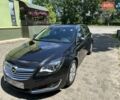 Чорний Опель Інсігнія, об'ємом двигуна 2 л та пробігом 340 тис. км за 8500 $, фото 3 на Automoto.ua