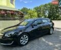 Черный Опель Инсигния, объемом двигателя 2 л и пробегом 340 тыс. км за 8500 $, фото 1 на Automoto.ua