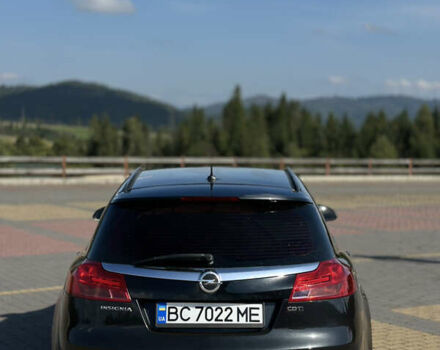 Черный Опель Инсигния, объемом двигателя 2 л и пробегом 299 тыс. км за 7799 $, фото 1 на Automoto.ua